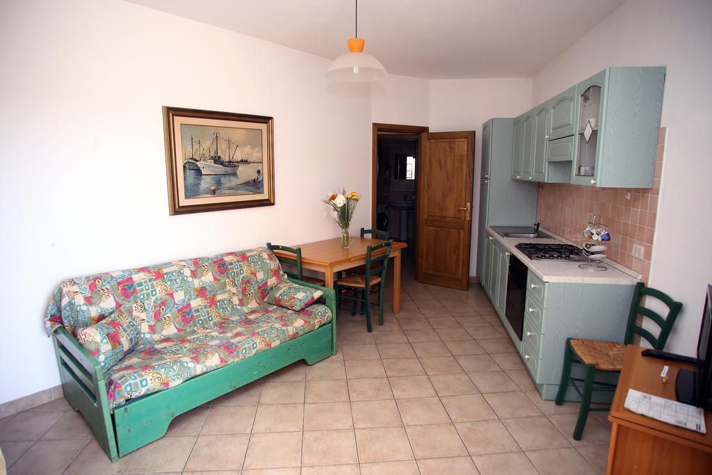 Appartamenti Ideal Isola Rossa Bagian luar foto